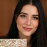 Portrait of Zeynep Yılmaz, a young artisan with an inlaid box.